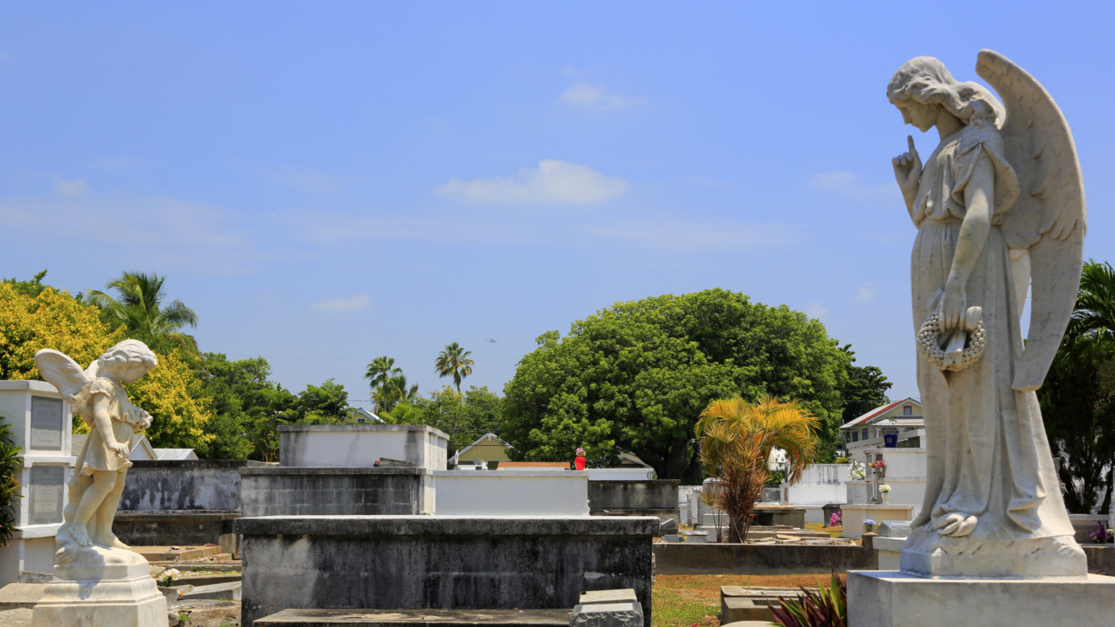 Tomb statues and above ground tombs in historic Key West Cemetery.