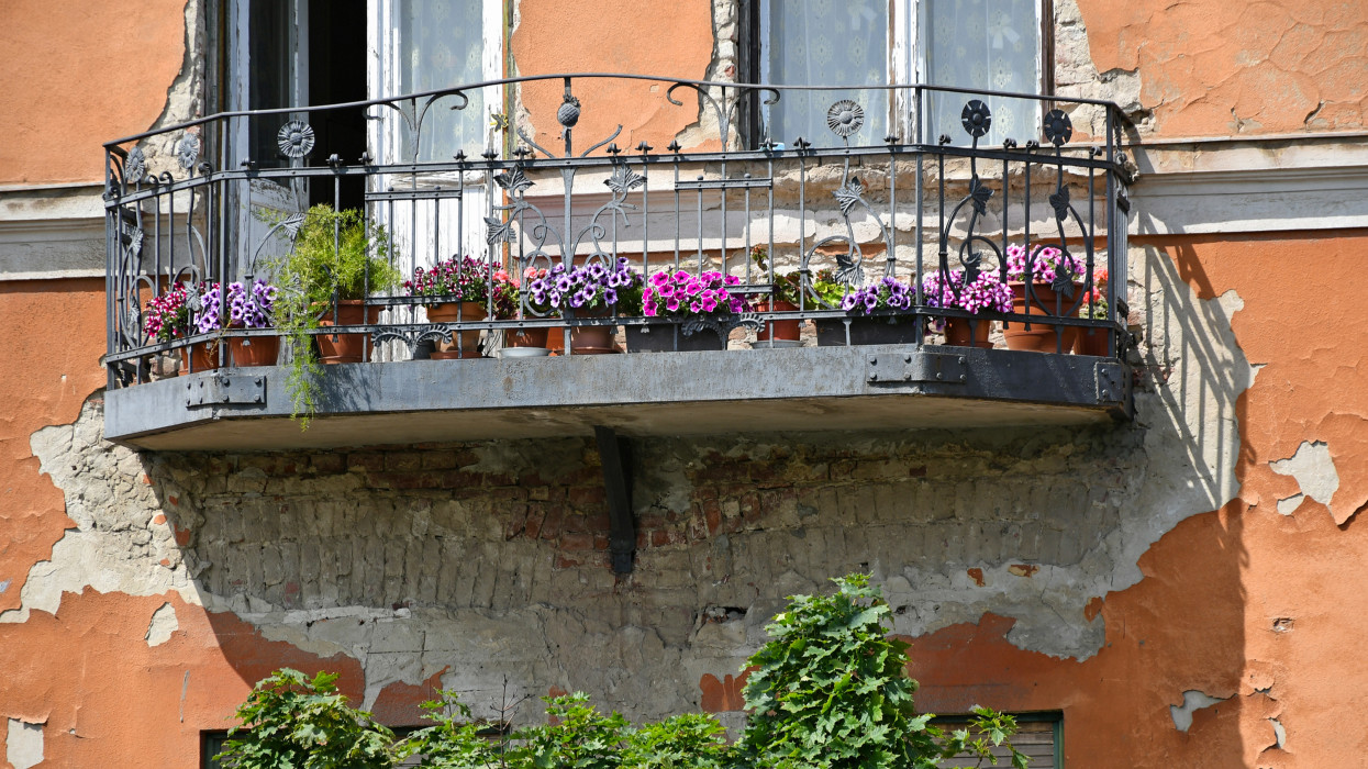 Balcony of an old house with flowers
