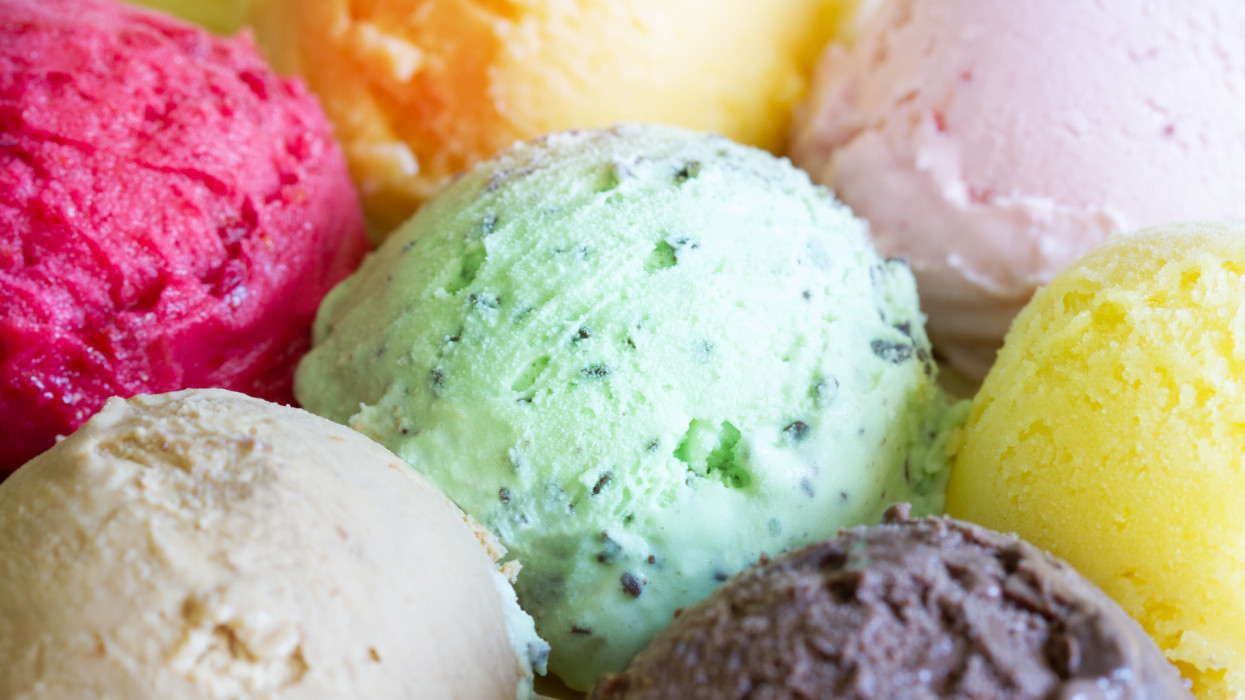 Colorful scoops ice cream background concept closeup