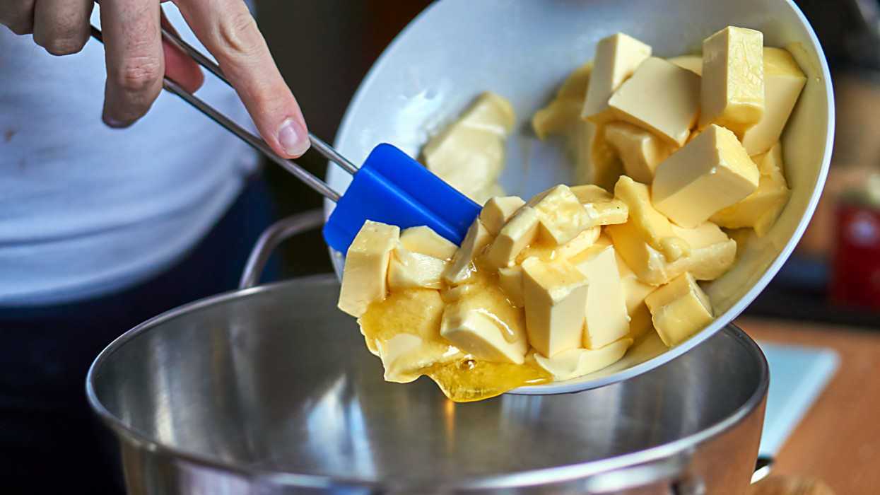 Put the butter cubes in a mixing bowl