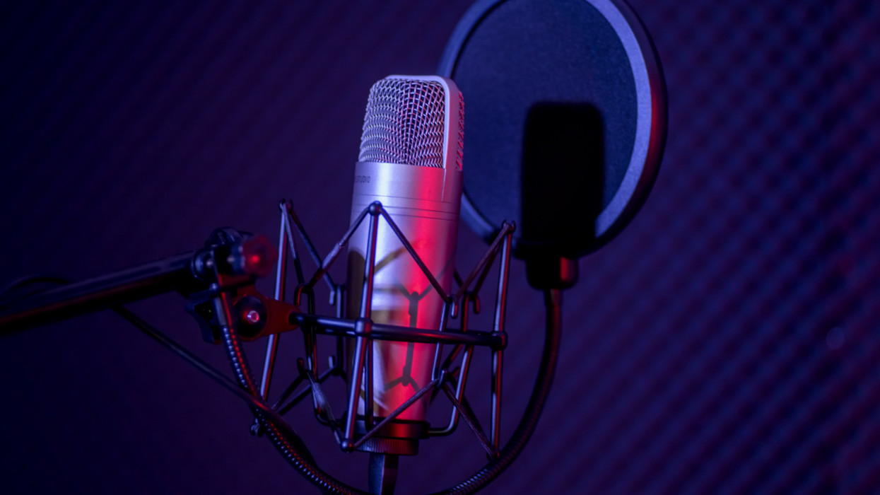 Microphone in radio station broadcasting studio.