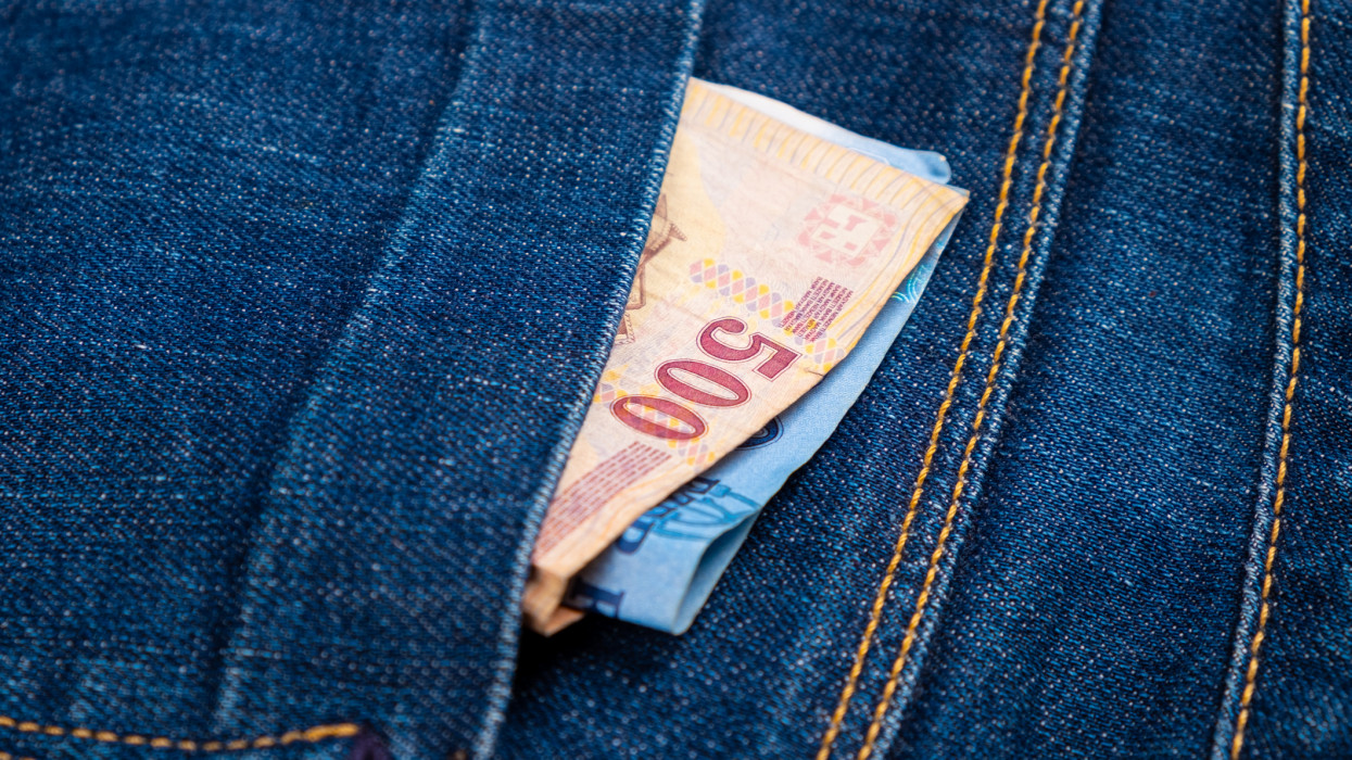 paper money in jeans pocket,forints cash closeup.