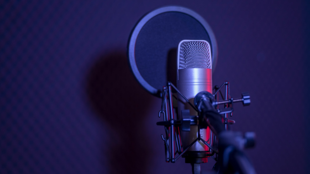 Microphone in radio station broadcasting studio.