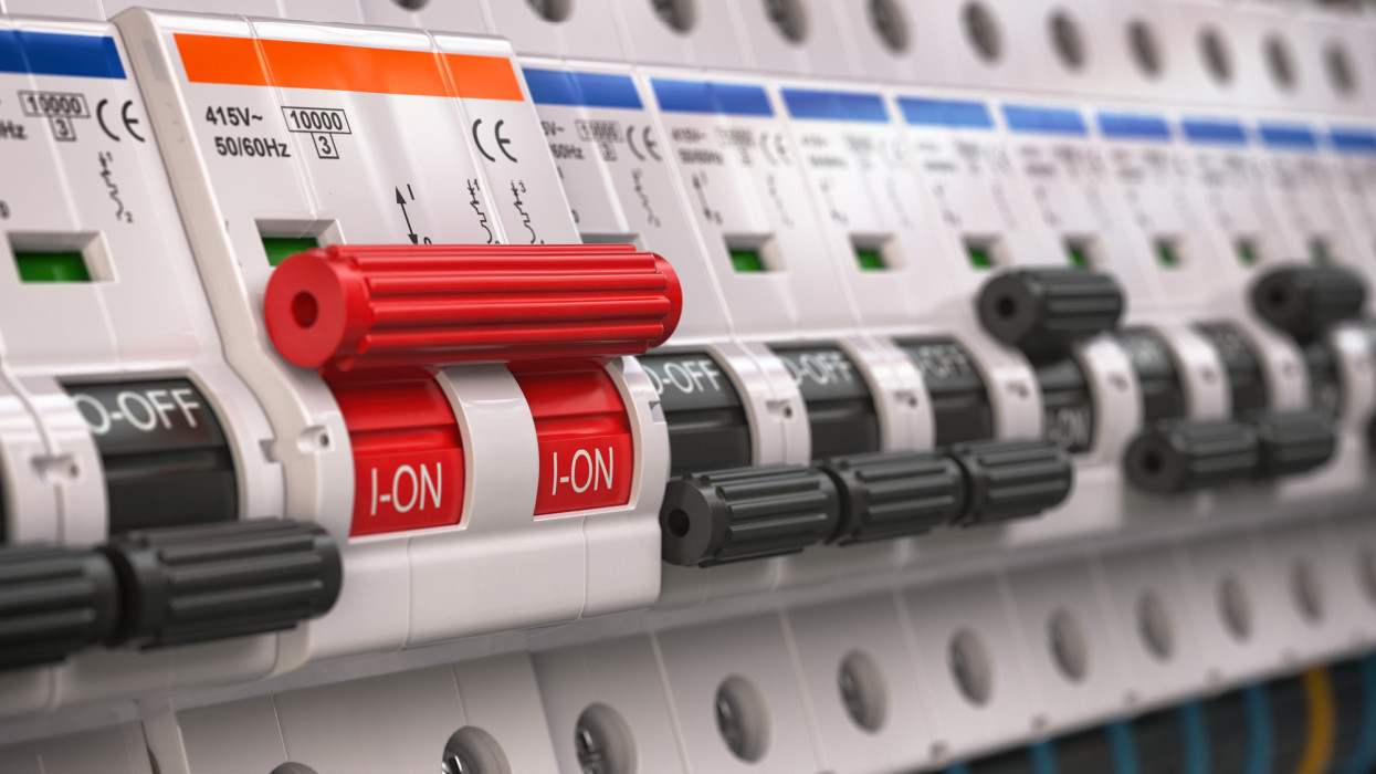 Switches in fusebox. Many black circuit brakers in a row in position OFF and one red switch in position ON. 3d illustration