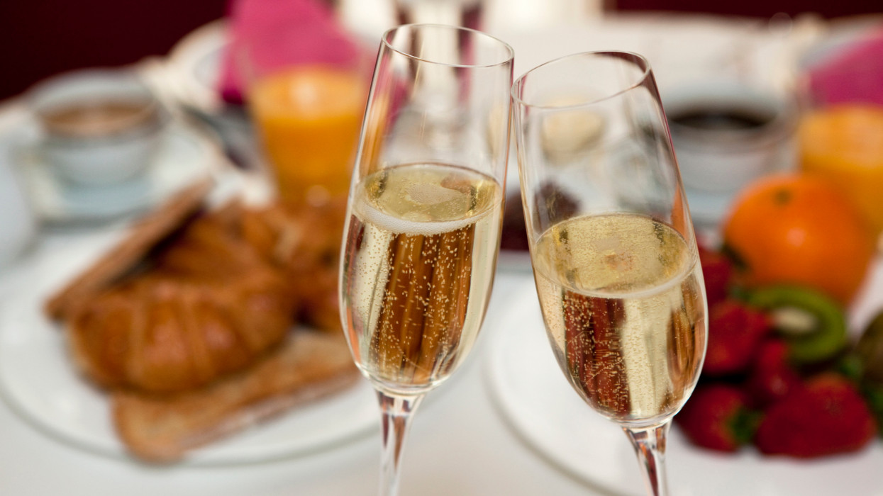Toast with champagne at breakfast.