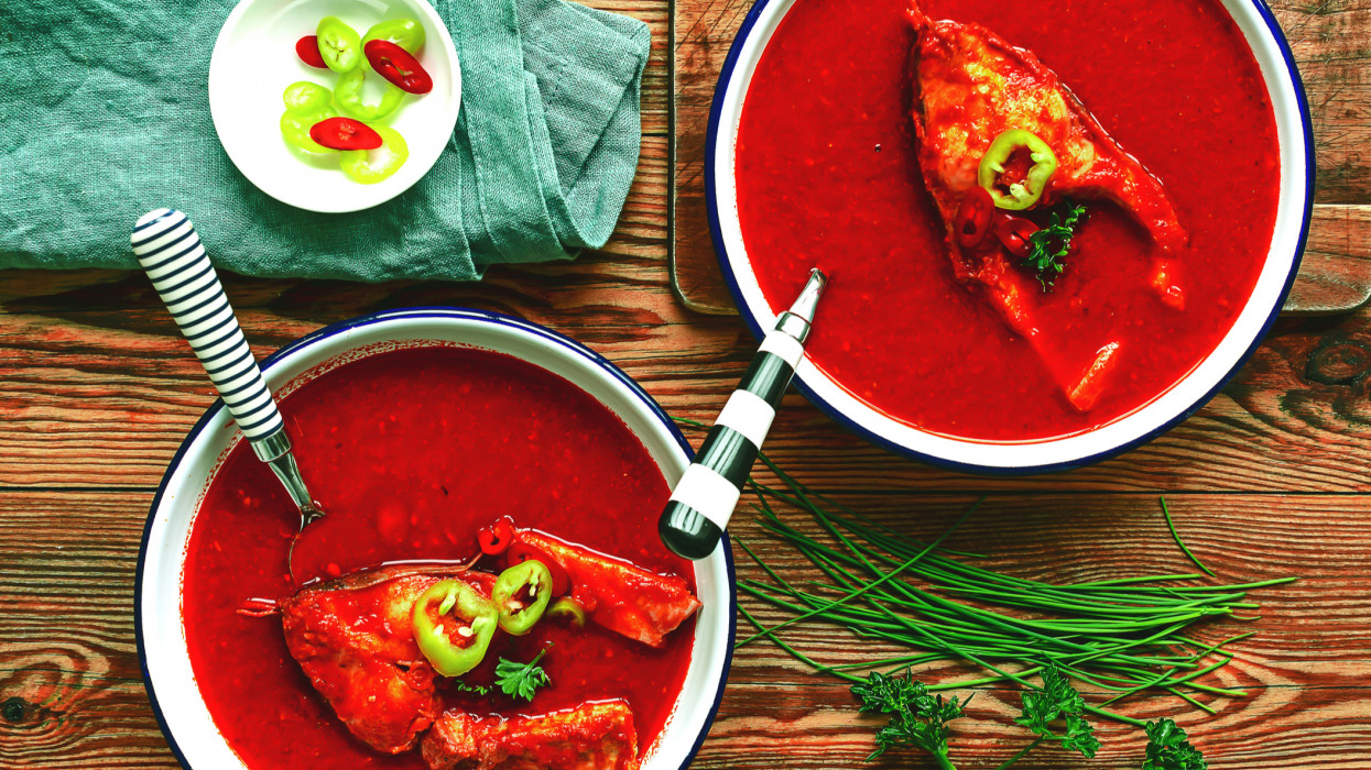 Traditional hungarian fish soup with paprika and carp