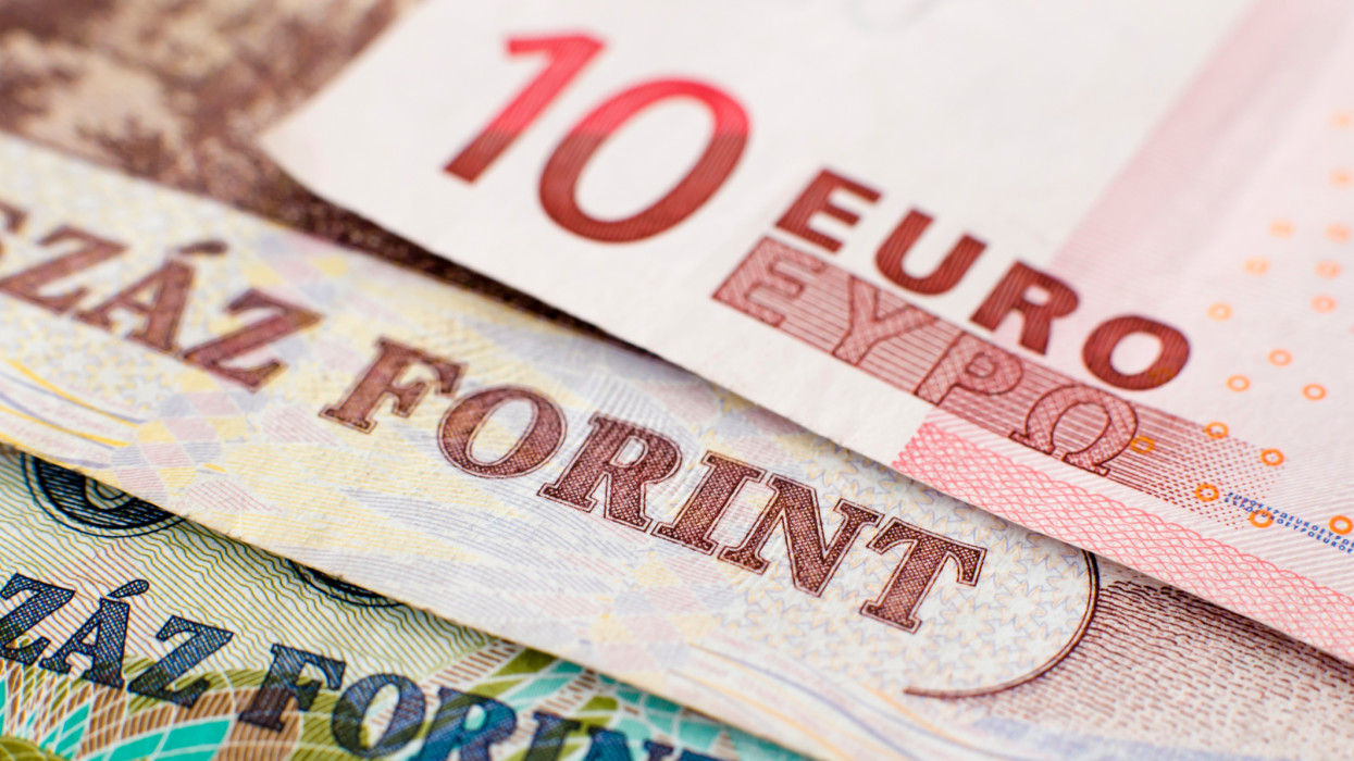 10 Euro banknote sits on top of two Hungarian Forint Banknotes