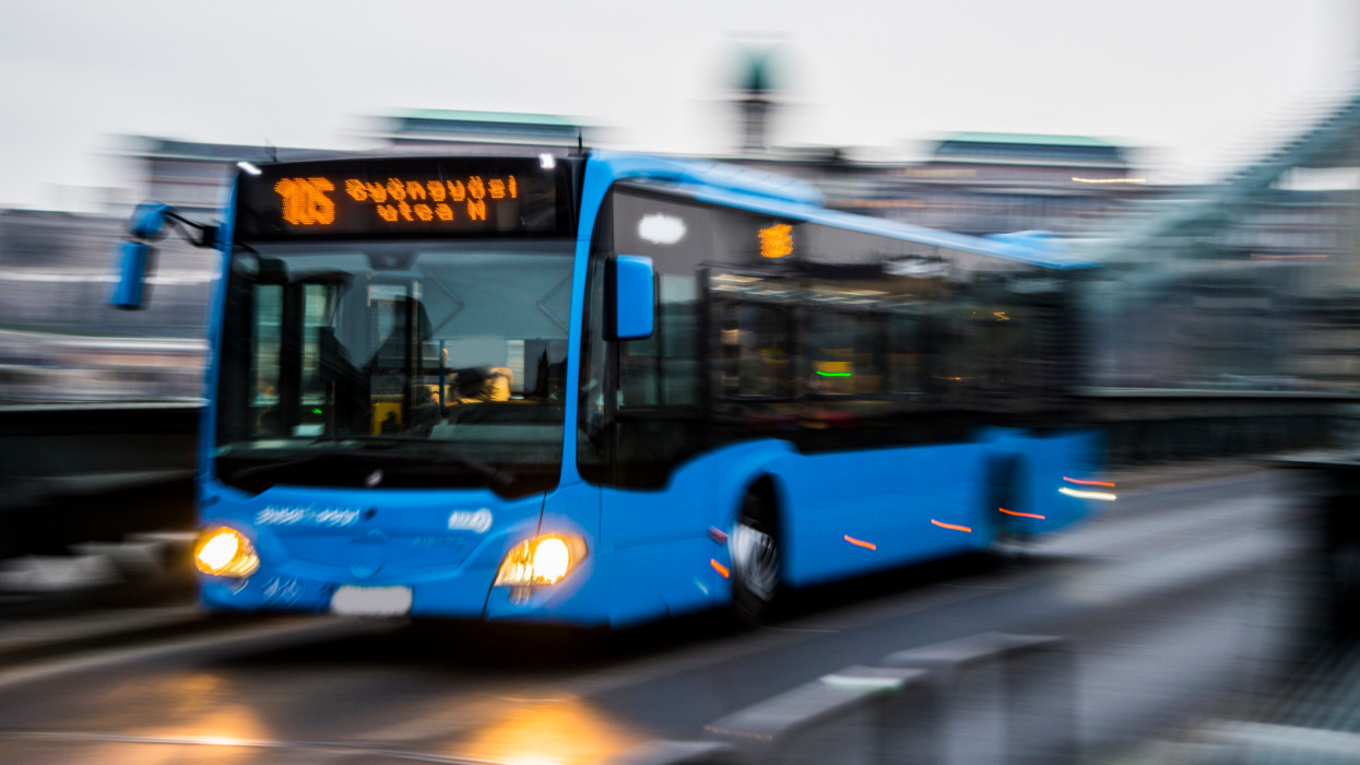 A budapest blue bus in motion