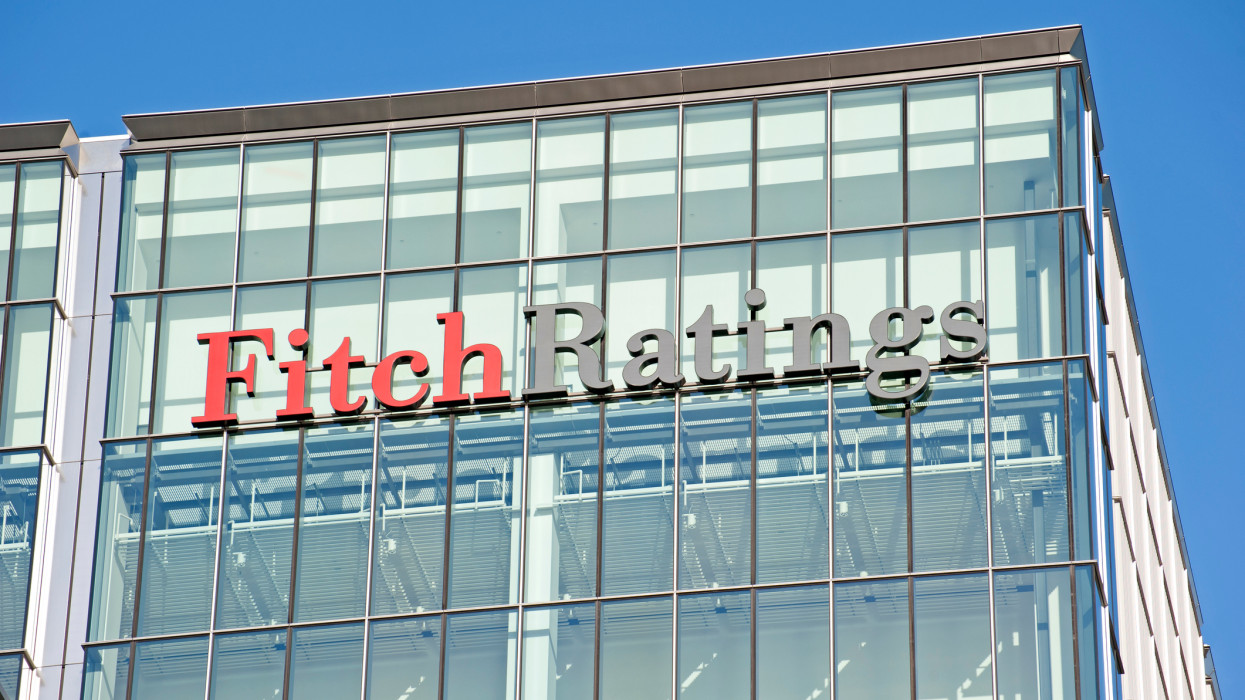 London, United Kingdom-January 7, 2012: Sign for Fitch Ratings, on the office building in Canary Wharf. Fitch Ratings -one of the rating agencies play significant roles in the financial system.