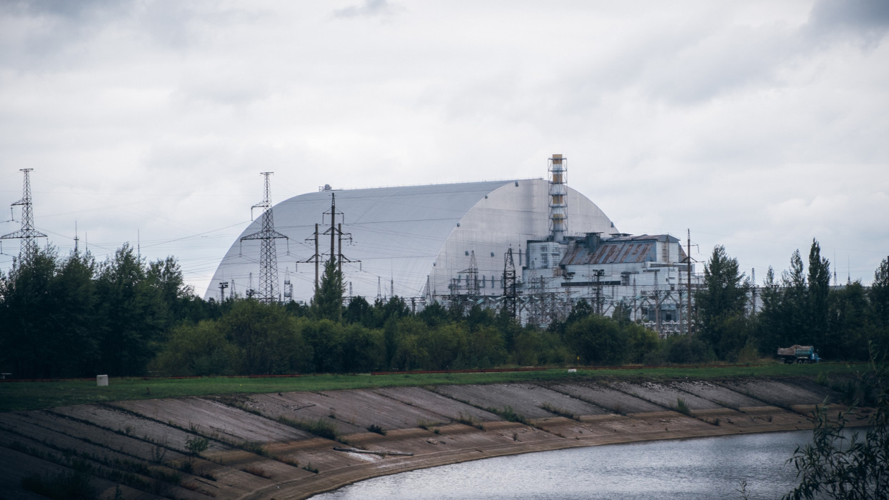 The New Safe Confinement (new shelter) over the remains of reactor 4 and the old sarcophagus at Chernobyl nuclear power plant