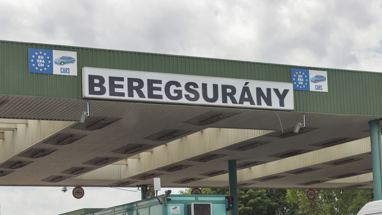 BEREGSURANY, HUNGARY - JULY 08, 2019: Cars stopped on customs checkpoint of Hungarian-Ukrainian state border between Beregsurany, Hungary and Berehove, Ukraine.