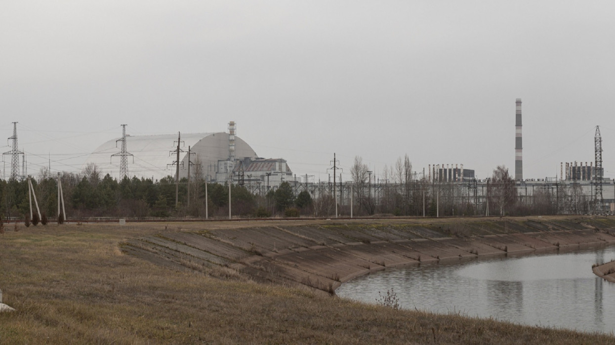Chernobyl nuclear power plant with a new safe confinement. Chernobyl, Ukraine. Panorama. Pripyat, Ukraine - November 28, 2021.