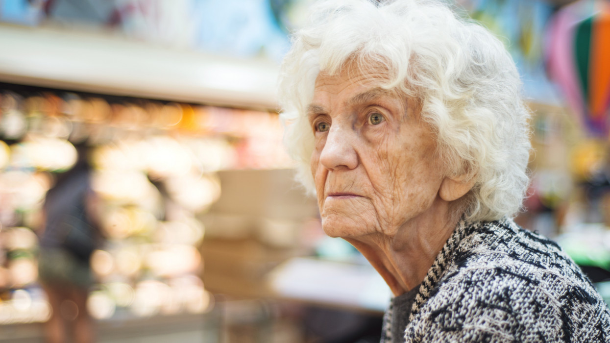 Senior Woman Shopping in Grocery Store