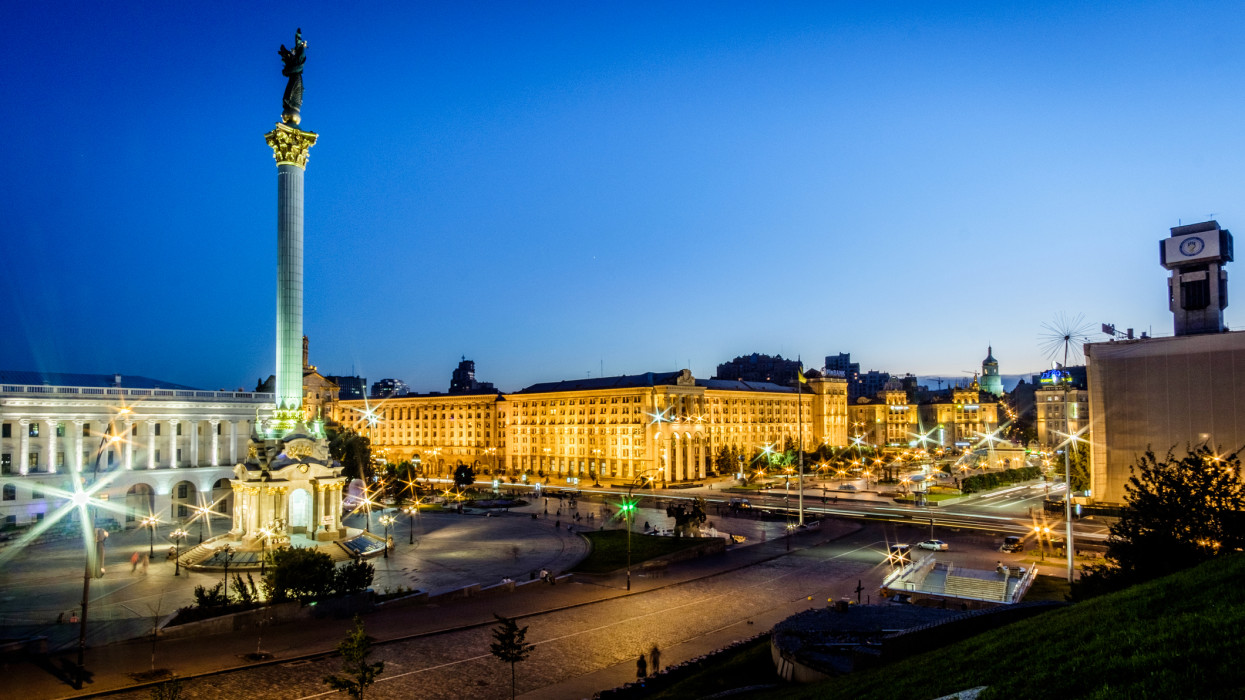Maidan Nezalezhnosti central squarewith independence monument at dusk in Kiev, Ukraine, 15 July 2016