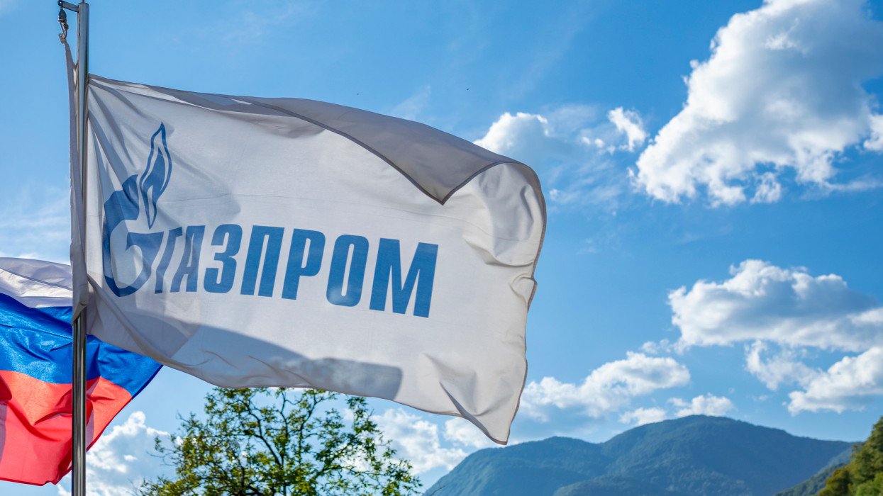 Gazprom flag against a sky. Gazprom is oil and gas company. Krasnodar region, Russia - August 22, 2020.