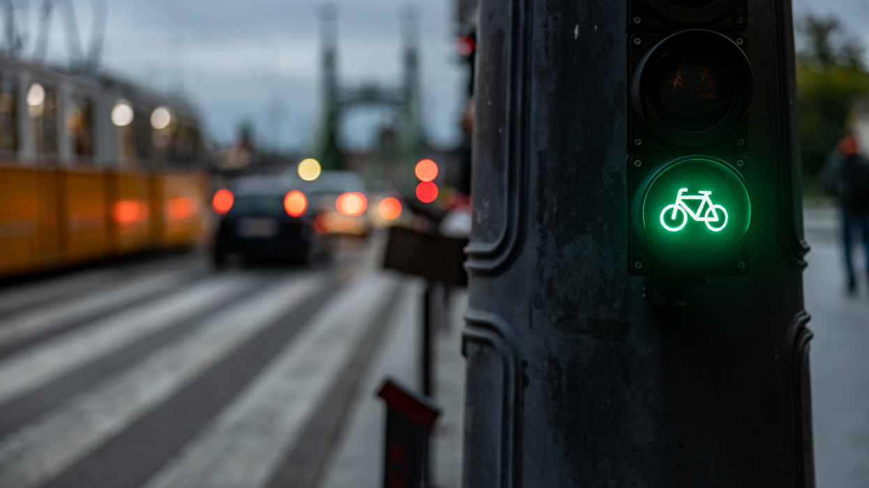 green sign for bicycles on the streets of the city of Budapest