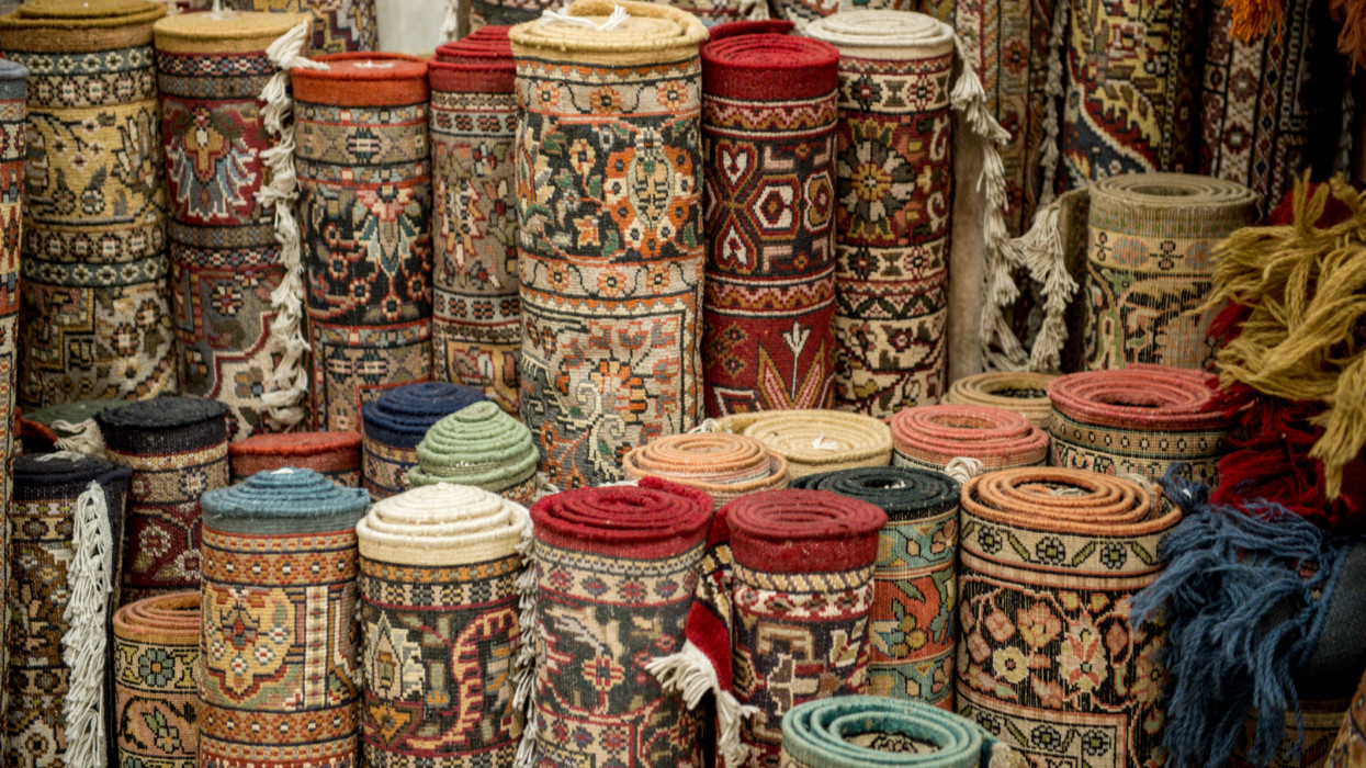 Jaipur, India - Rolled up traditional oriental rugs