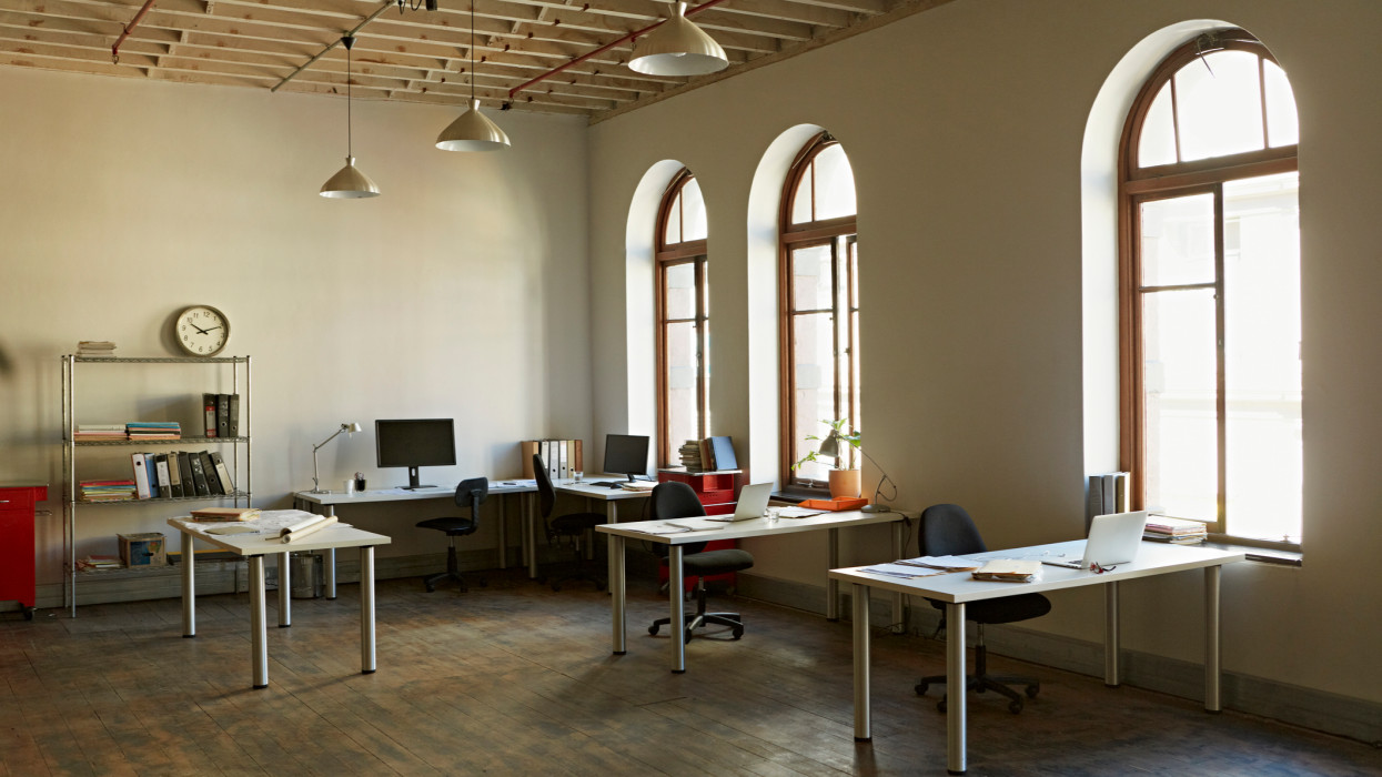 Modern bright office space with wooden floors
