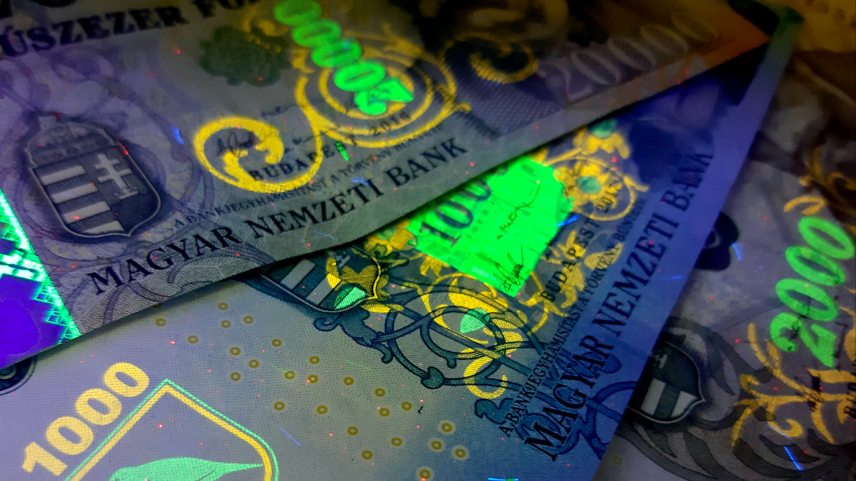 Hungarian forint banknotes in UV light