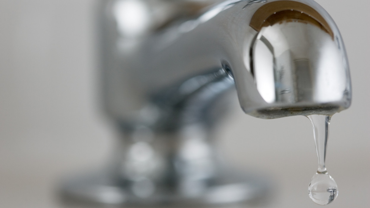 LONDON, UNITED KINGDOM - JANUARY 16:  Water drips from a domestic tap, United Kingdom.