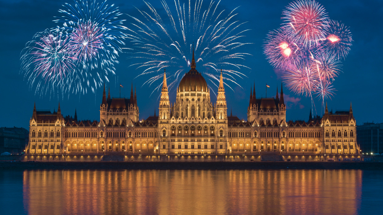 View of The Hungarian Parliament with fireworks in Budapest, Hungary