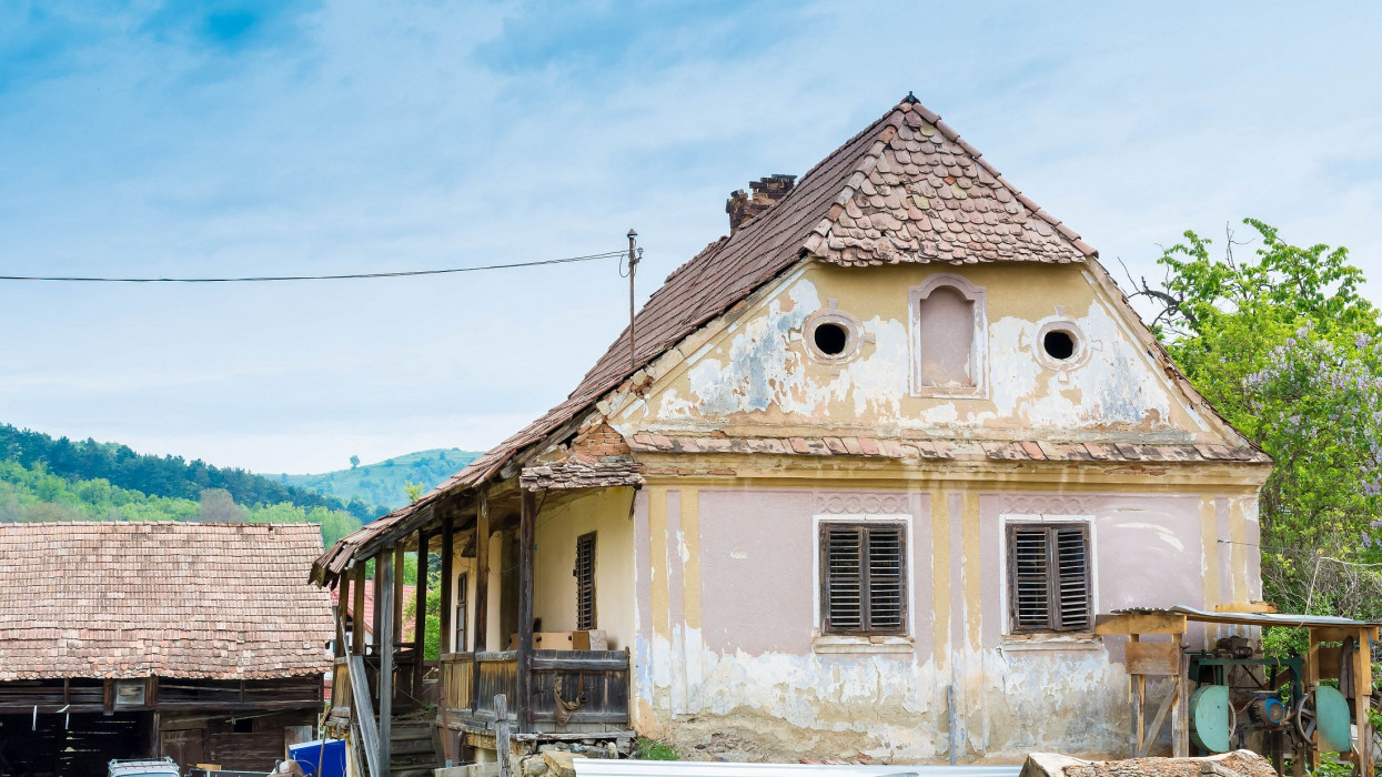 Abandoned worn house in a village. country hungary town ruined