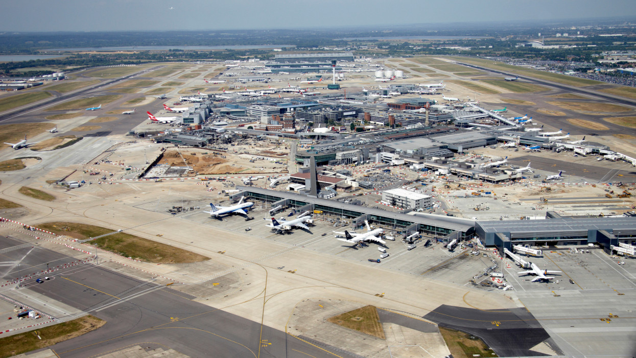 Aerial Photography view west ofHeathrow airport with the runways and terminal buildings, London Hounslow Middlesex TW6 UK
