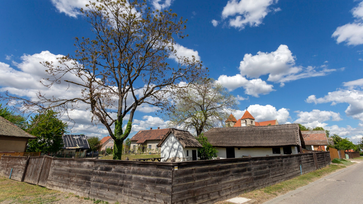 Traditional village house in Ocsa, Hungary on a sunny spring day.