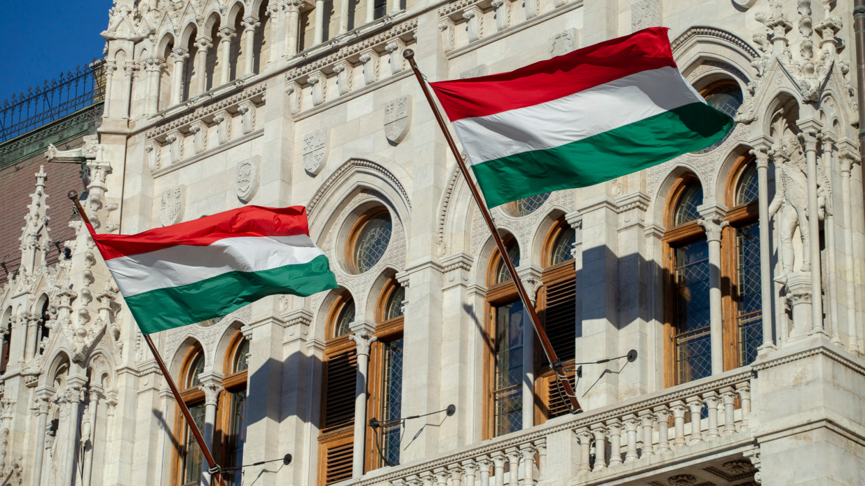 Hungarian flags on the Hungarian Parliament Building on a sunny winter morning.