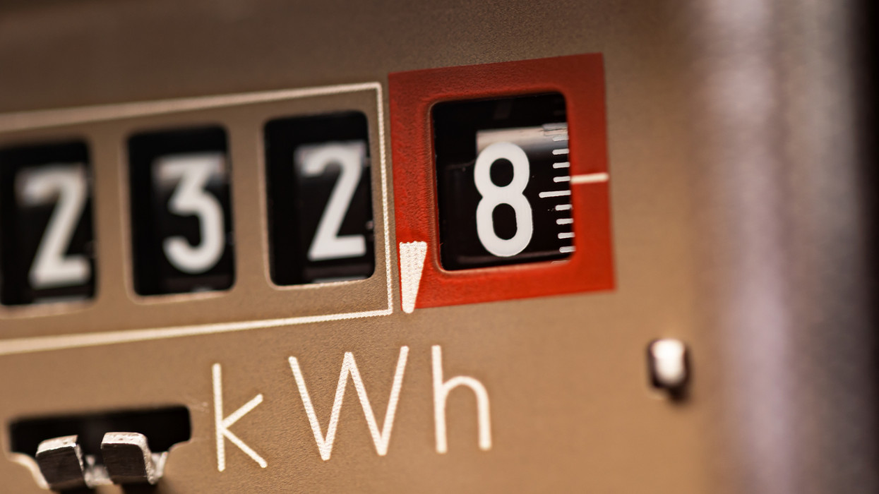 Analog electricity meter for households. Measuring used electricity in kWh ( kilowatt hour )