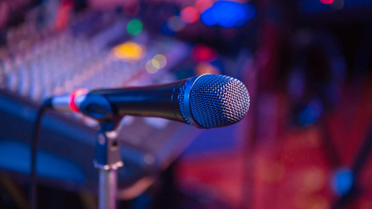 Microphone. Microphone close-up. A pub. Bar. A restaurant. Classical music. Music