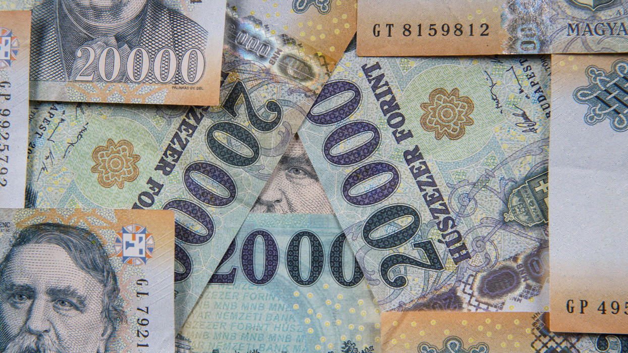 Stack of banknotes as background (Hungarian Forint) 20000 forint banknotes Ferenc Deak close up as a background. Europe Hungary. The all-seeing eye motif.