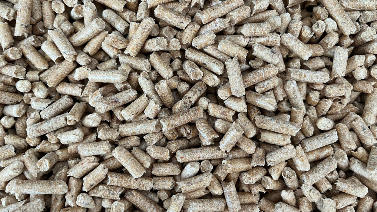 close-up of pellet-like fuel inside a stove