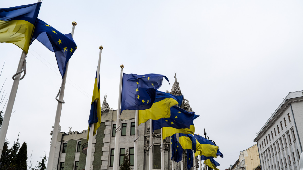 Government building in Kiev with Ukrainian and European Union flags.