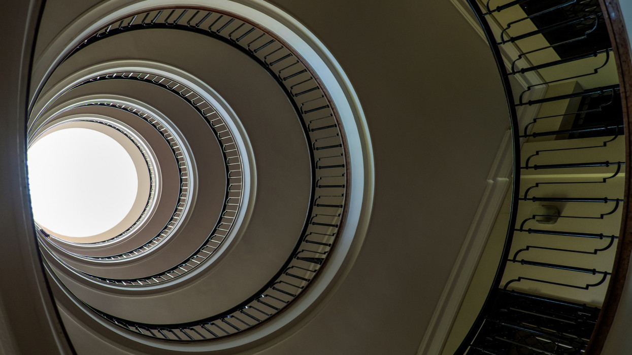 The spiral staircase of the Avenue condominium in Rakoczi street. Budapest, capital of Hungary