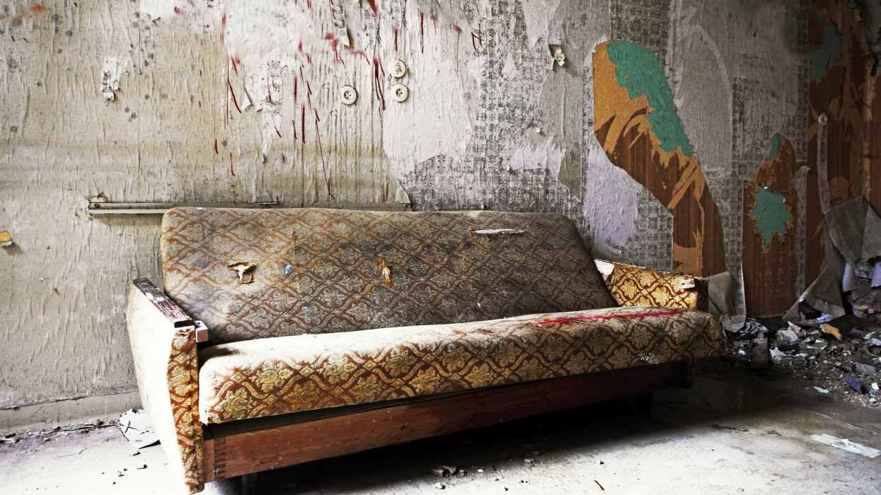 Old sofa in an abandoned building (building meanwhile demolished)