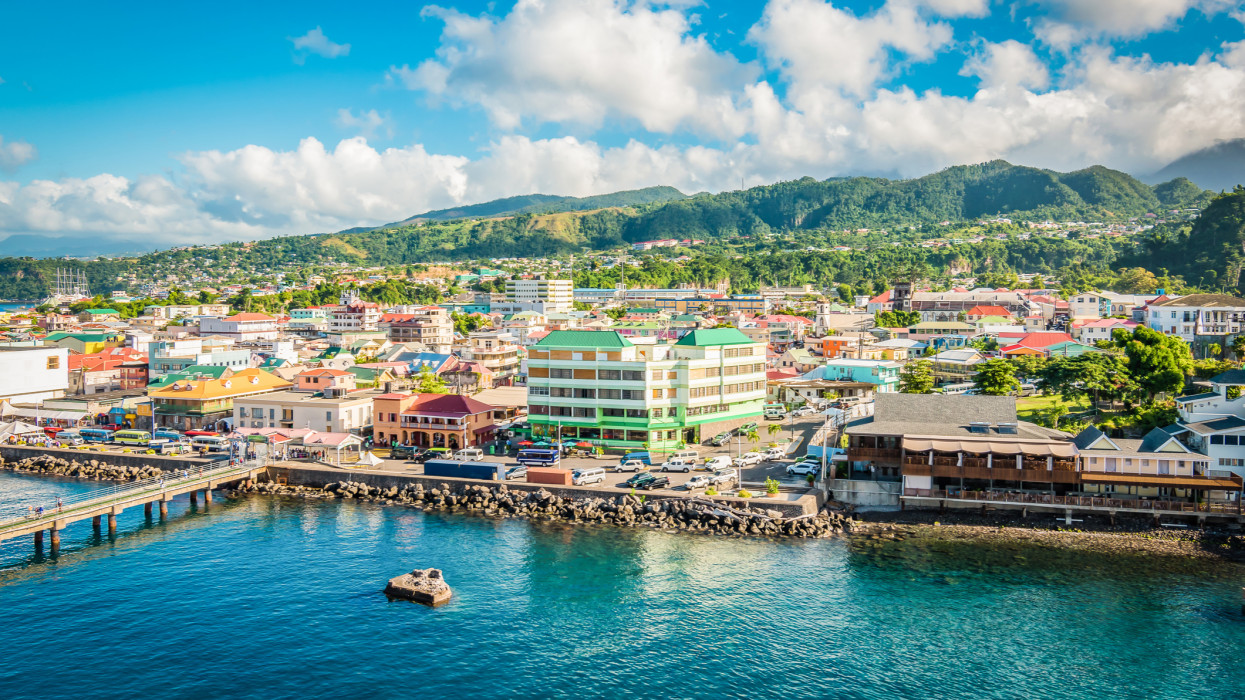 Bright and colorful landscape with cruise port and skyline of Roseau in Dominica, Caribbean Island.
