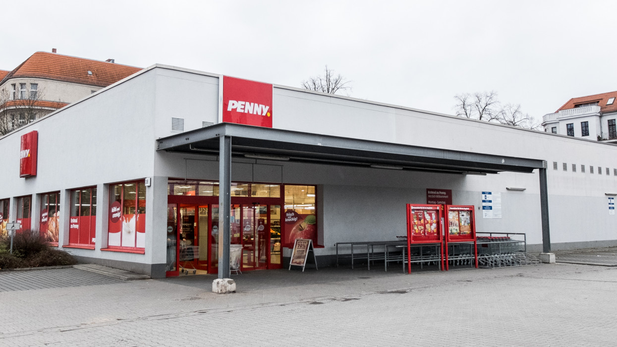 Berlin, Germany - January 9, 2015: Penny supermarket at Berlin. The Penny Markt GmbH is the discount sales line for food Cologne Rewe Group. It was founded in 1973 and works in Germany with more than 2,200 markets. Office is the headquarters of the Rewe Group in Cologne . In each of the eight penny - regions, there are one or more administrative seats with logistics centers.