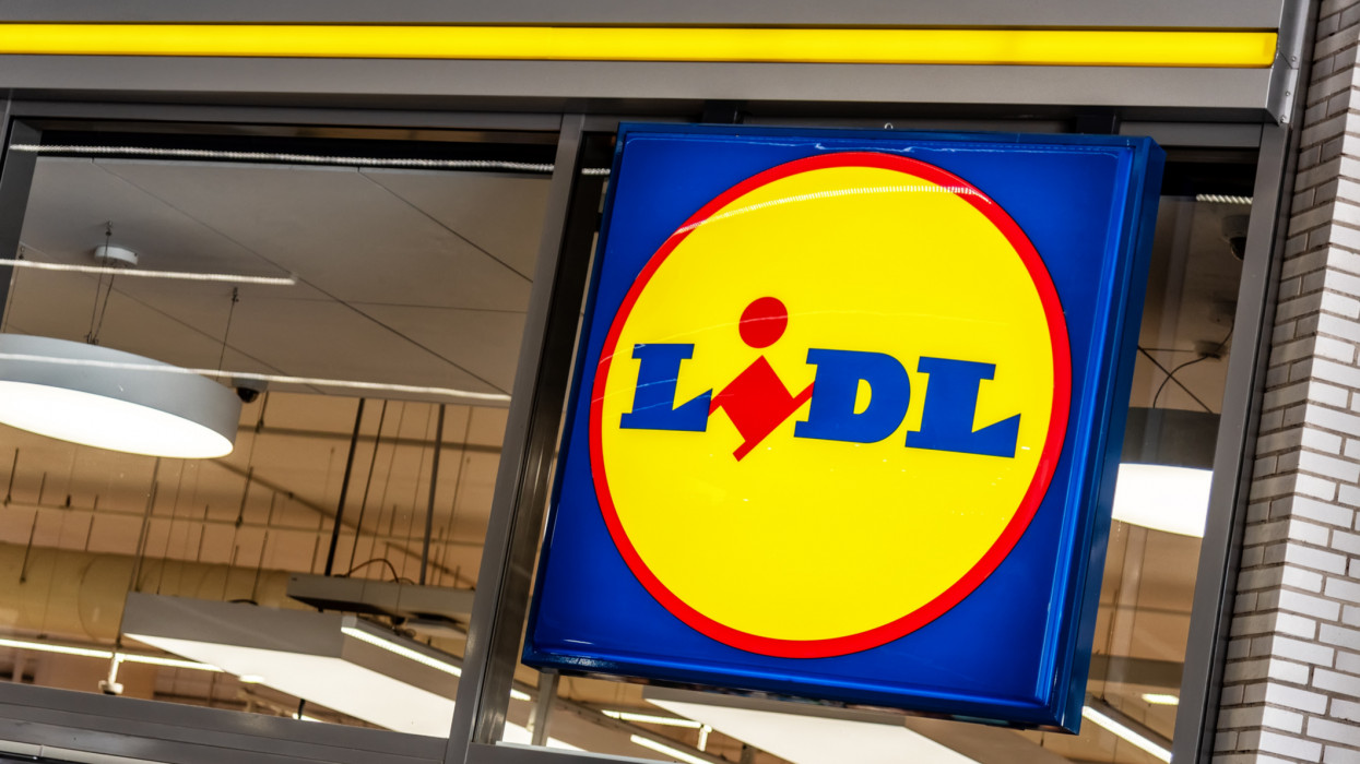 Barcelona, Spain - June 2022: Lidl logo on the supermarket located in the Mercat de Sant Antoni in Barcelona. Lidl Stiftung Co. KG is a supermarket chain of German origin.