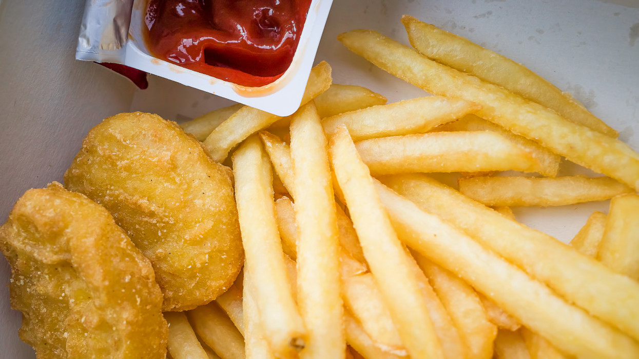 Chicken nuggets and fries with ketchup