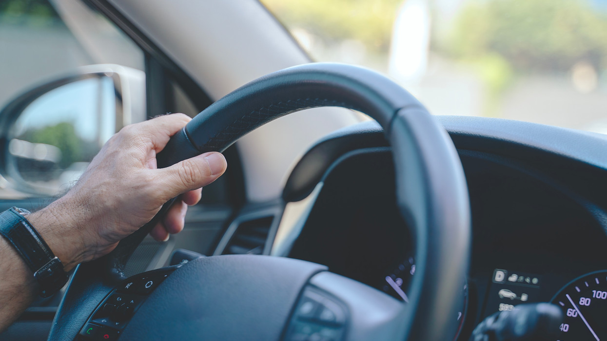Hands on steering wheel, Driving car