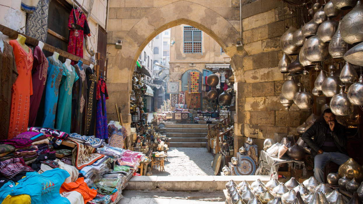 A street view of an arch and market stalls in Islamic Cairo, one of the oldest districts in Cairo city, Egypt.