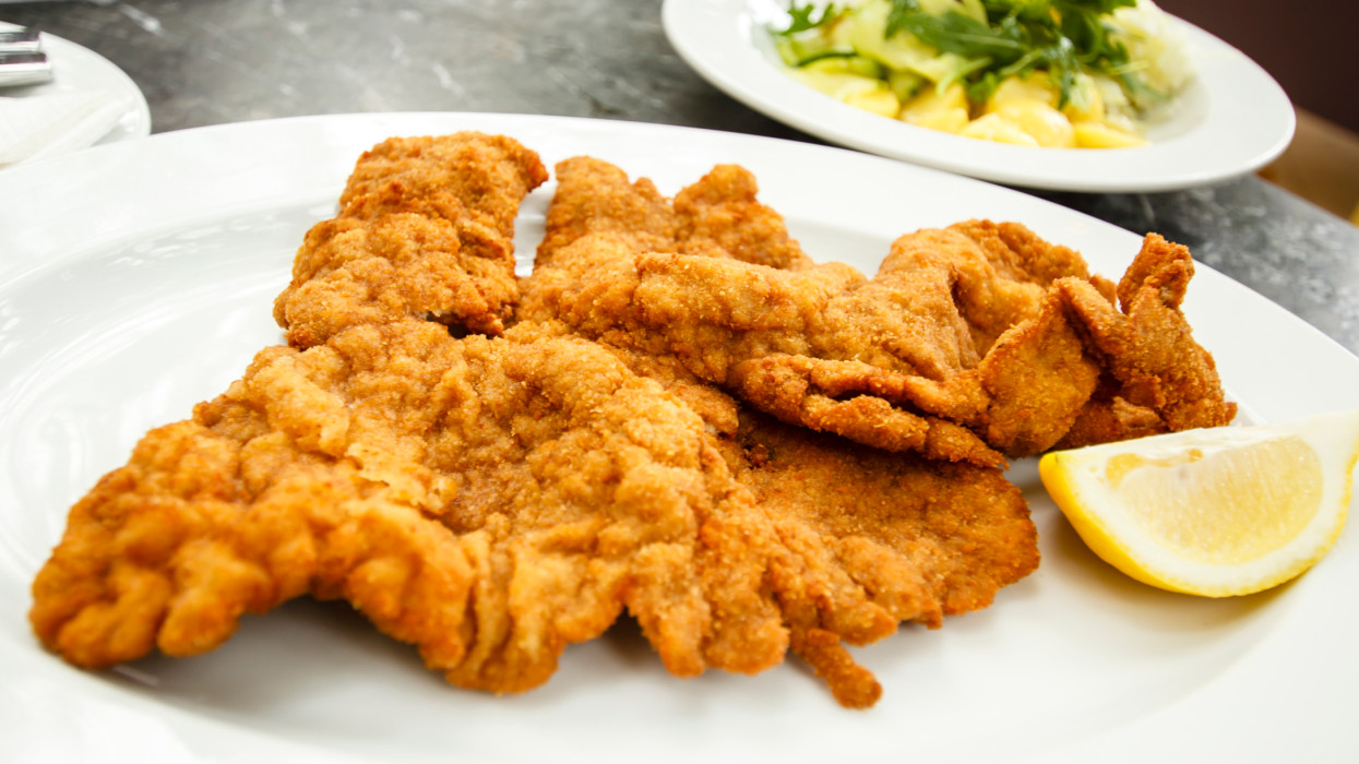 Traditional Wiener schnitzel, classic speciality of the Viennese cuisine, Vienna, Austria