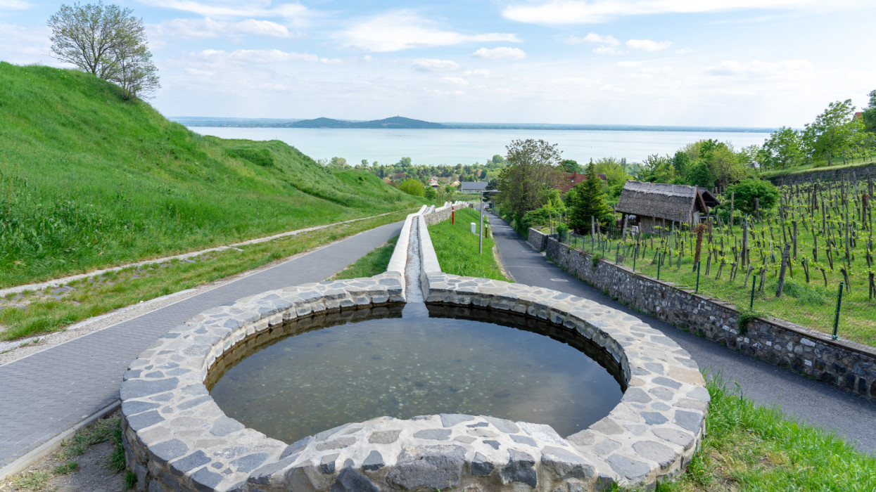 Vineyards wine gardens at Lake Balaton in Baracsony Hungray with beautiful view kisfaludy street with fountain .