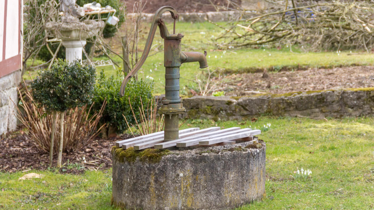 rural scenery including a nostalgic water pump