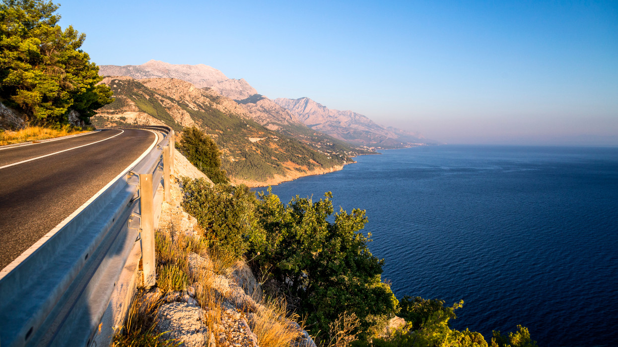 South Dalmatian coastal road to the south of Split on a sunny summer evening, Dalmatia, Croatia.