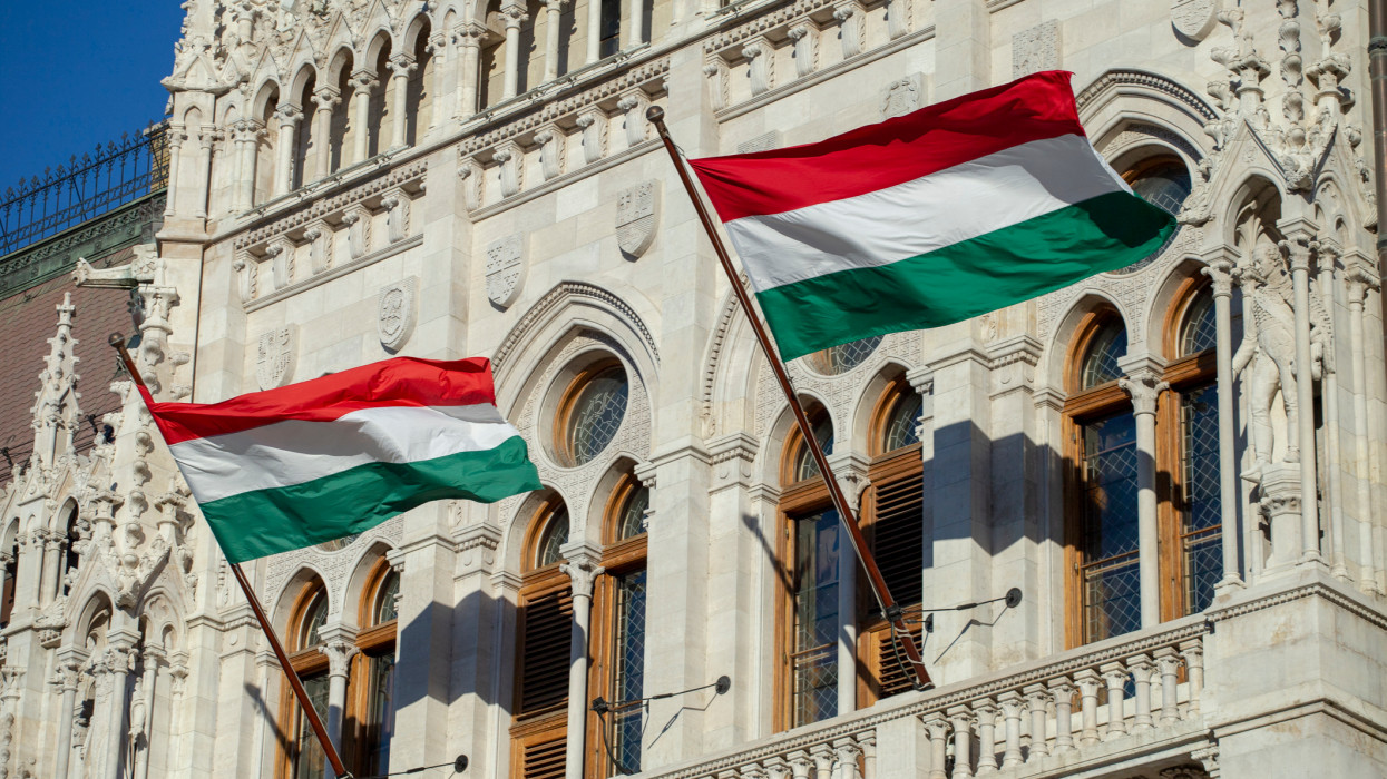 Hungarian flags on the Hungarian Parliament Building on a sunny winter morning.