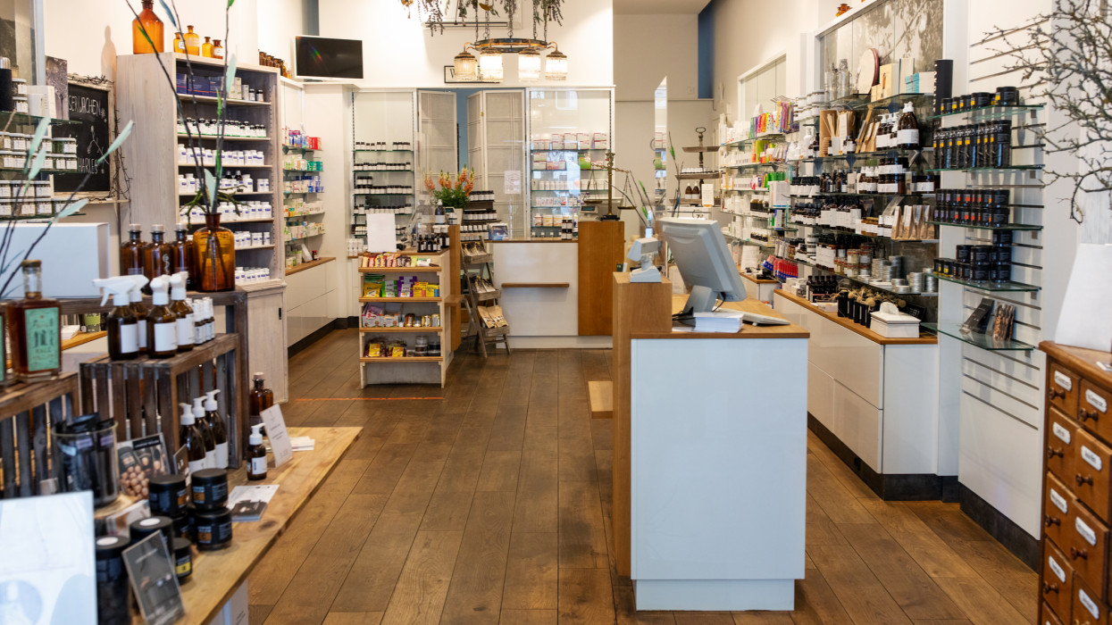 Inside of a medical store with no people. Homeopathic drugstore interior.