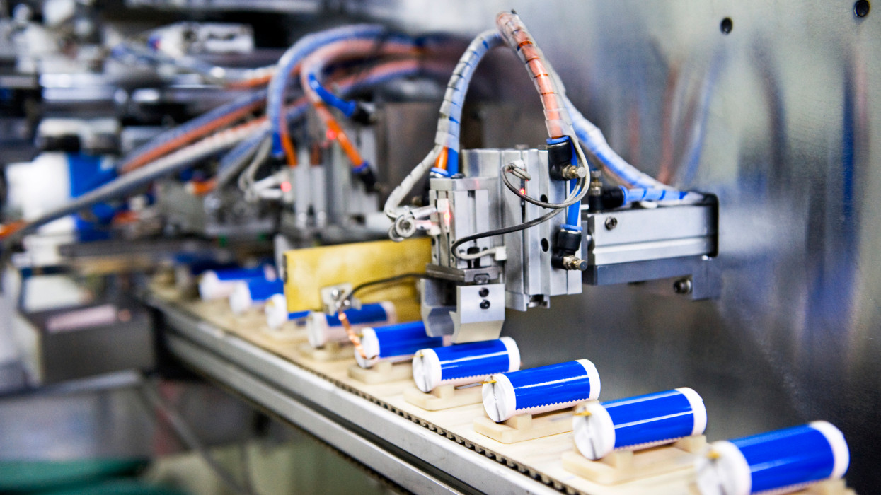 High tech Li-ion batteries being produced by an automated machine. Shot in a Li-ion Battery Co. which develops, manufactures, and markets cylindrical type rechargeable Li-ion batteries.