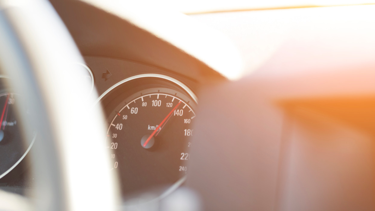 Photograph of the odometer of a vehicle traveling at high speed on a motorway